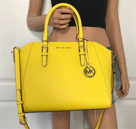 michael kors yellow leather tote|Michael Kors black nylon tote.